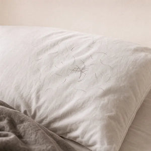 Pelos en la almohada al despertar